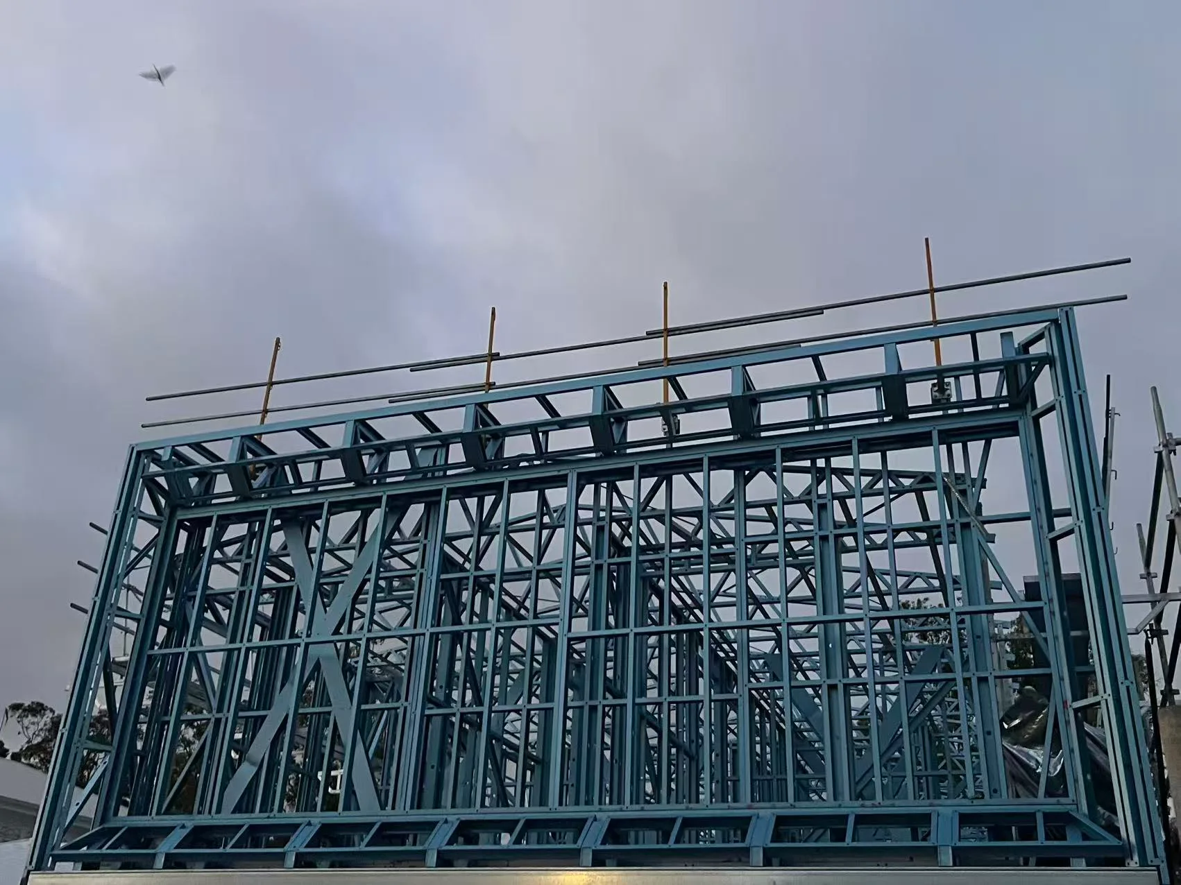 Upper-level steel framing and scaffolding