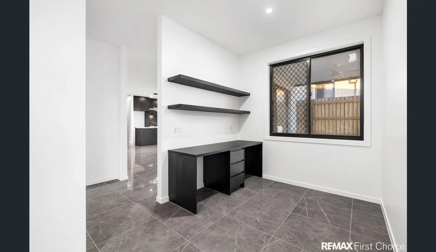 Built-in study desk alongside the living area